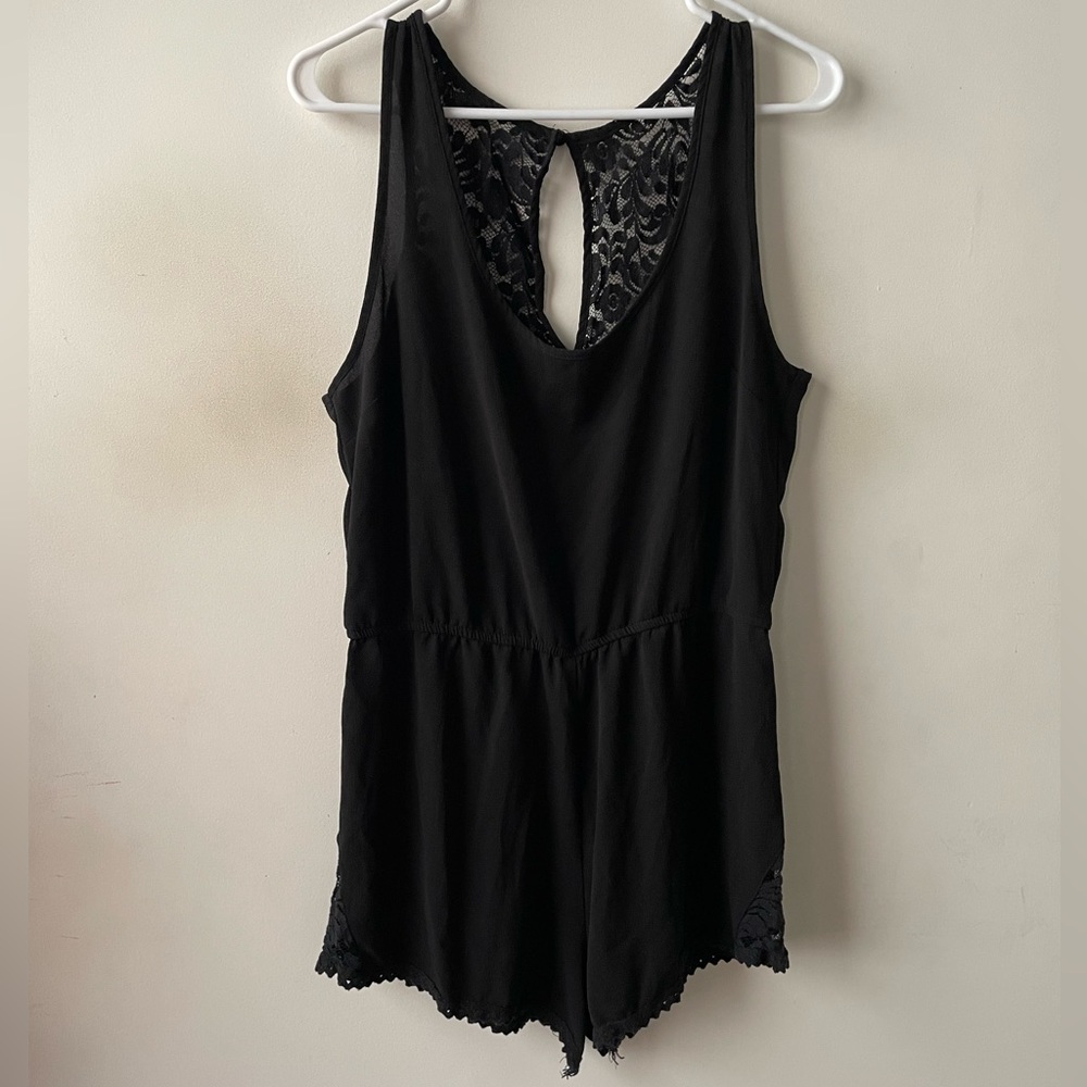 Black romper with lace back trim